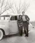 Wantha and Lendol Davis with the automobile they drove around the Western racing circuit in the 1940s. (21kb)